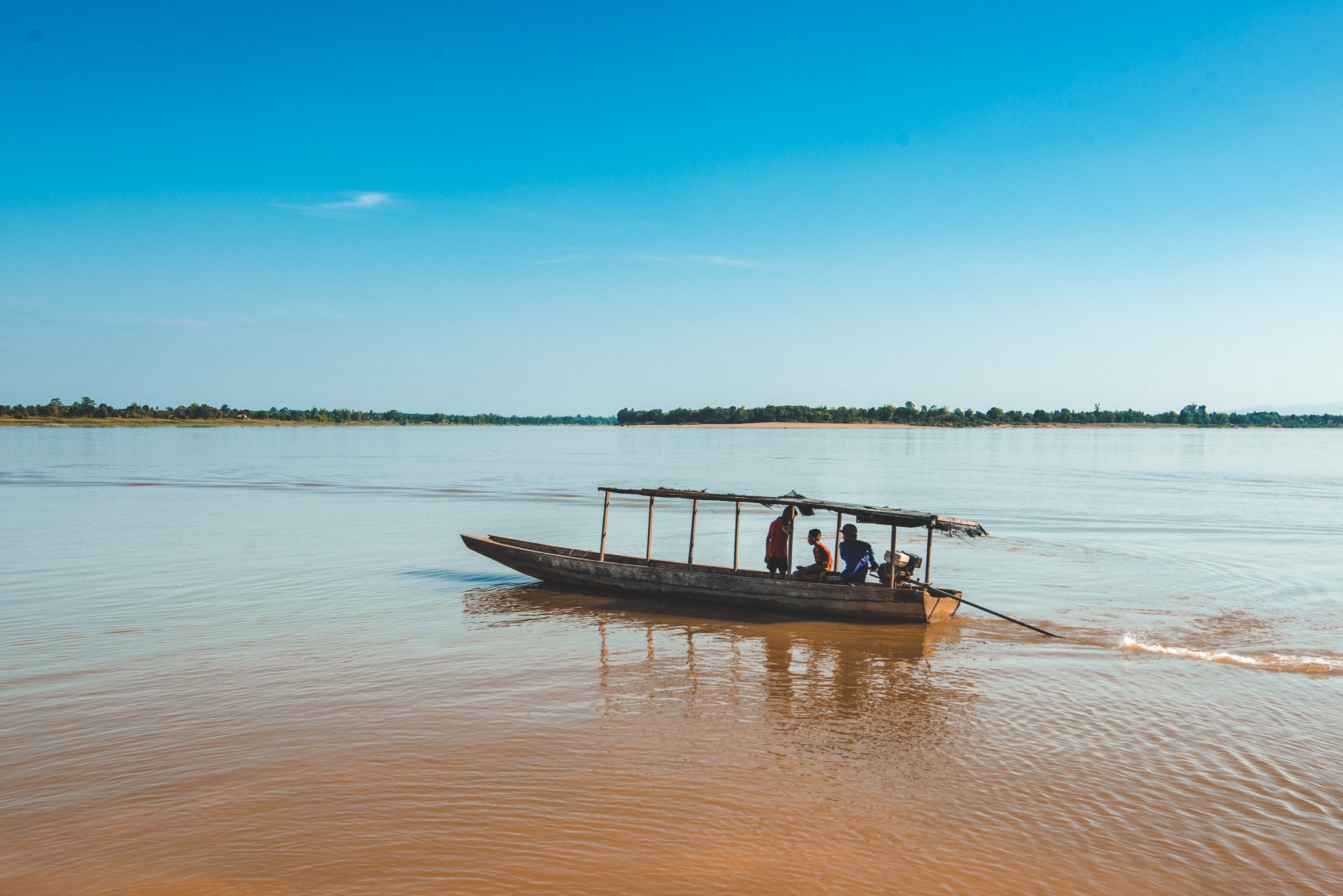 Wooden boat on the Mekong River near Champasak, Southern Laos